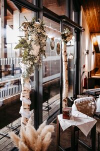 Blumenschmuck Traubogen weiss grün