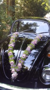 Blumengirlande für VW Käfer